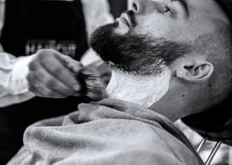 barber soaps the neck